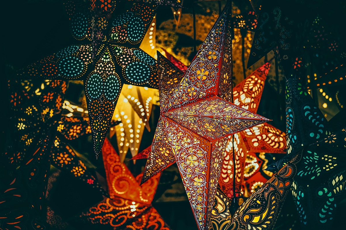 Small Christmas market with craft stalls on Simon Stevinplein in Bruges